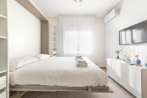Posteľ alebo postele v izbe v ubytovaní Piazza Tripoli bright apartment