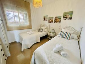 Ένα ή περισσότερα κρεβάτια σε δωμάτιο στο A823 - Cala Palmera - 2004 Finestrat s.l. +47 φωτογραφίες