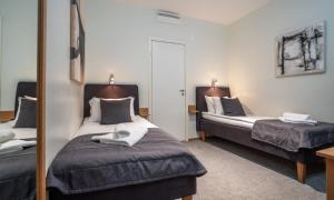 Uma cama ou camas num quarto em Thon Partner Hotel Kungsbron