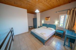 Postel nebo postele na pokoji v ubytování Cretan Life Holidays