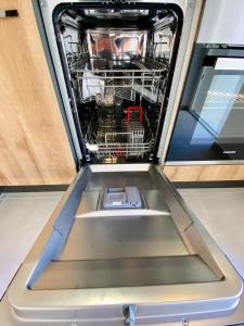 a dishwasher in the back of a truck at Apartment Katrin im Zentrum in Bad Ischl