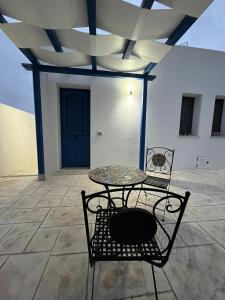 Patio nebo venkovní prostory v ubytování B&B Santorini