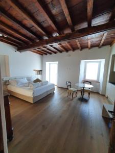 Postel nebo postele na pokoji v ubytování Casa Castagna 1620