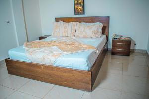 מיטה או מיטות בחדר ב-Hotel Murex