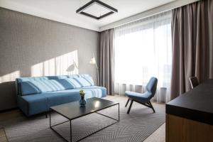 Posezení v ubytování Q Hotel Plus Wrocław Bielany
