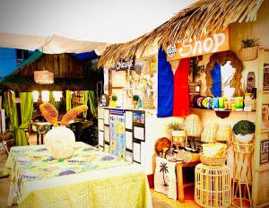 a store with a shop with a table in front of it at BACKDOOR VILLA in Baler
