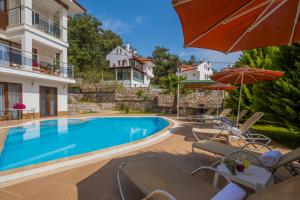Πισίνα στο ή κοντά στο Infinity Olympia Villas
