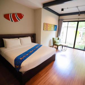 Ένα ή περισσότερα κρεβάτια σε δωμάτιο στο Tolopoti Hotel&Resort