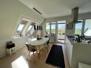 صورة لـ Apartment Ruhetgaard Bed & kitchen في اروسكوبينغ