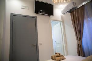 Postel nebo postele na pokoji v ubytování FlyHouse Fiumicino