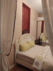 a bedroom with a swinging bed with a mirror at Atlashouse in Rīga