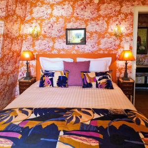 Ένα ή περισσότερα κρεβάτια σε δωμάτιο στο Chateau de Hiéville