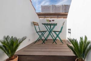 Balkón alebo terasa v ubytovaní Living4Malaga Suite Flamingo Apartment