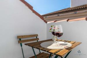 Nápoje v ubytovaní Living4Malaga Suite Flamingo Apartment