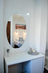 Posteľ alebo postele v izbe v ubytovaní Armanda Rooms