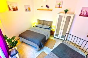 a bedroom with a bed in a room at Plaza de Cárcel 3-bedroom Apartment in El Puerto de Santa María