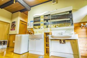 Kjøkken eller kjøkkenkrok på Stay and Discover Nishinoya