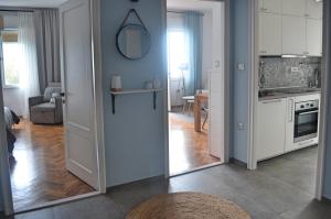 Kuchyň nebo kuchyňský kout v ubytování Apartment Céleste - Directly on the Beach + 3 fotografie