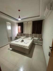 Postel nebo postele na pokoji v ubytování Hotel Cumbica Guarulhos