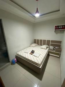 Postel nebo postele na pokoji v ubytování Hotel Cumbica Guarulhos