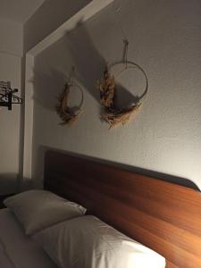 Postel nebo postele na pokoji v ubytování New Era