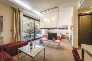 Кът за сядане в Hotel & Apartments HEC Residence