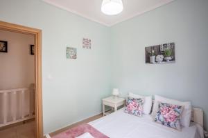 Postel nebo postele na pokoji v ubytování Sea side home Valentina