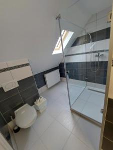 A bathroom at Palma Vendégház