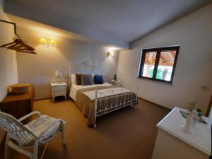 Postel nebo postele na pokoji v ubytování Villa Residenza Medea