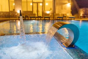 Bazén v ubytování ILIADA-ODYSSEAS RESORT nebo v jeho okolí