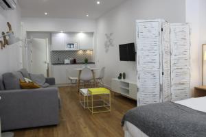TV a/nebo společenská místnost v ubytování Encanto de la Catedral Ha Loft
