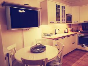 A kitchen or kitchenette at Lux House next to the Airport of Athens. Transport 24h