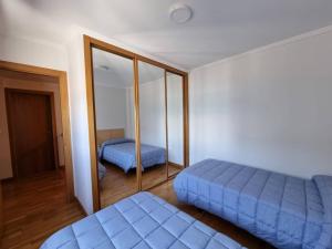 Postel nebo postele na pokoji v ubytování Mirador al Cantabrico