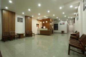 a large lobby with a waiting room with chairs at Hotel Katra Grand A Unit of Mal Mai Group in Katra