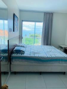 Katil atau katil-katil dalam bilik di Casa Lofstrom uma luxuosa com linda vista!