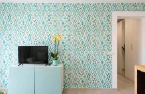 Et tv og/eller underholdning på 2 bedroom bungalow aguamarina