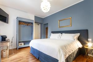 Un pat sau paturi într-o cameră la Albergo del Duca
