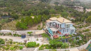 an aerial view of a house on a hill at Villa Matula in Kalamitsi