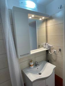 Ett badrum på Aqua Seaview Suite