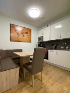 Kuchyň nebo kuchyňský kout v ubytování City Top - Apartment