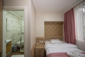 Koupelna v ubytování Hotel Melita