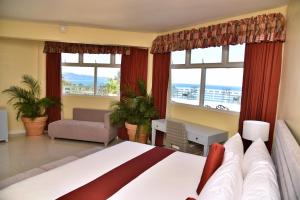 Lova arba lovos apgyvendinimo įstaigoje Hotel Grand A View