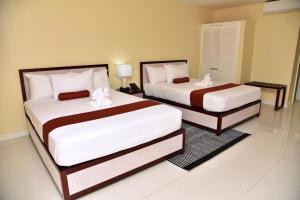 Lova arba lovos apgyvendinimo įstaigoje Hotel Grand A View