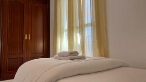 Posteľ alebo postele v izbe v ubytovaní Apartamento Duplex El Tinte