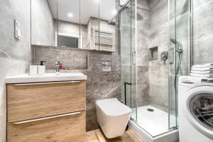 Kúpeľňa v ubytovaní Apartament 1000 Stare Miasto bulwary Apartamenty No 1 + 20 fotografií