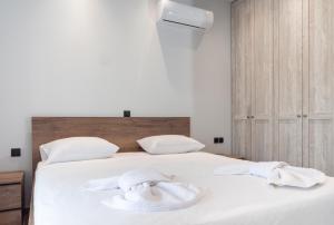 Posteľ alebo postele v izbe v ubytovaní Apartment Lazarous 3
