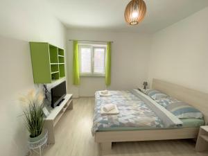 Posteľ alebo postele v izbe v ubytovaní Modern room old Town - Zadar