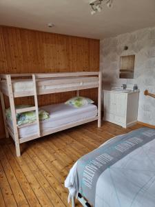 Postel nebo postele na pokoji v ubytování Le gîte l'écureuil