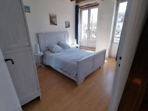 Postel nebo postele na pokoji v ubytování Hôtier des fées + 23 fotografií