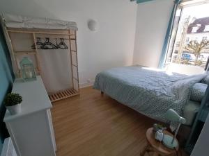 Postel nebo postele na pokoji v ubytování Hôtier des fées